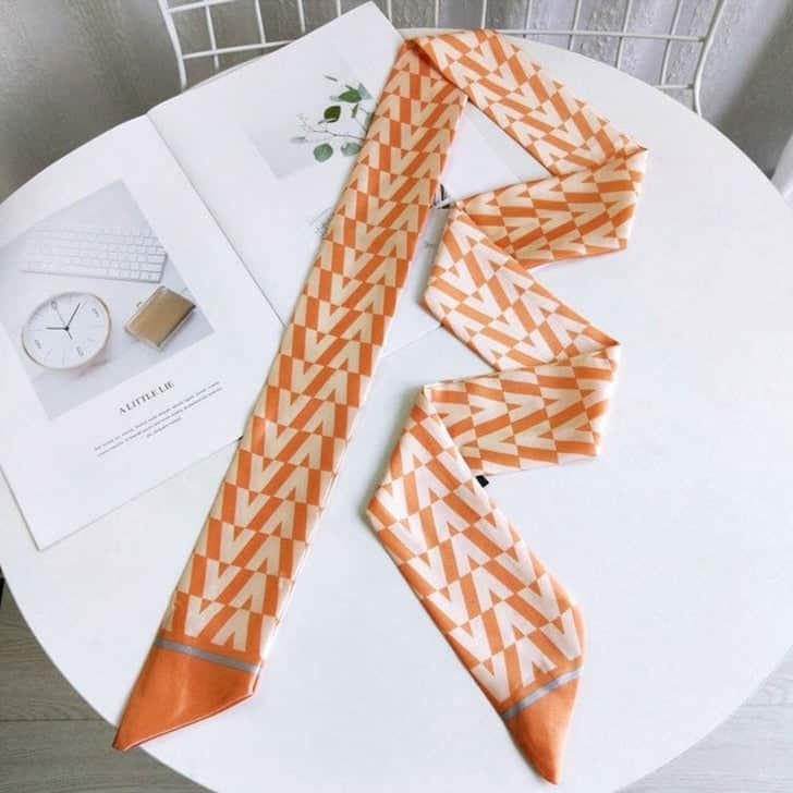 Orangefarbener Schalgürtel - Fischgrätenmuster